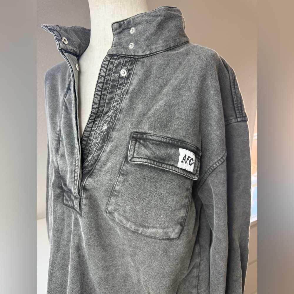 Grey vintage buttoned v-neck pullover sweater